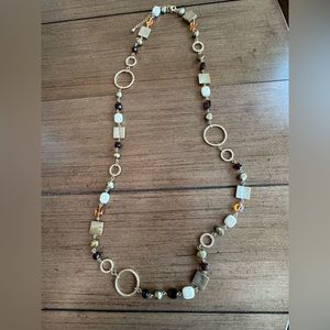 Leah Sophia brushed gold and brown stone necklace.